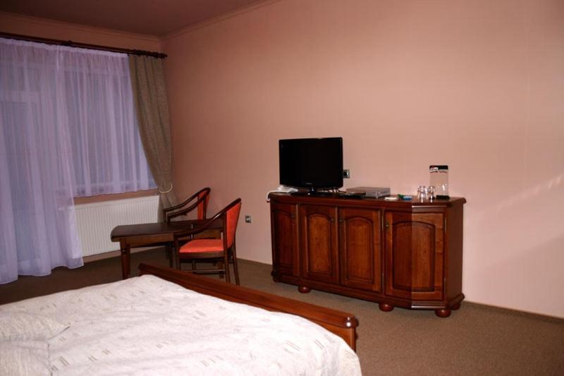 Zlaty Lev Hotel Louny Quarto foto